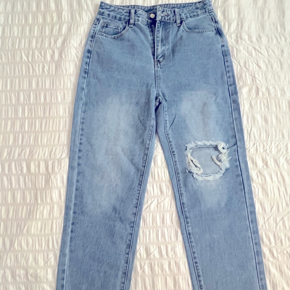 Blue, loose fitting, super comfortable distressed denim jeans